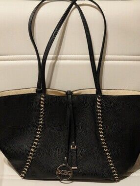 BCBG Large Black Tote with Gold Chain Trim and Logo Charm Duffle Bag..